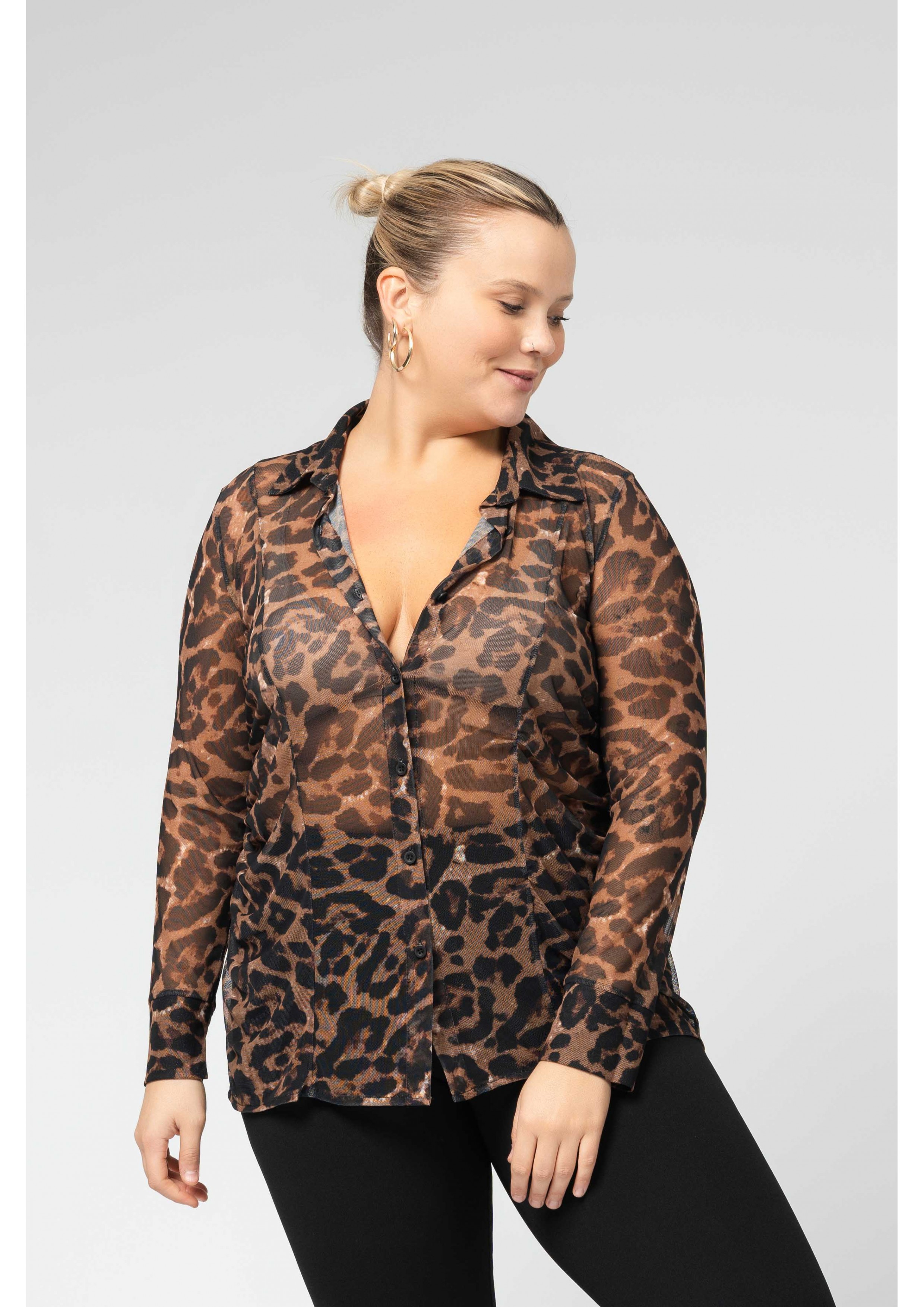 Blouse en résille imprimée...