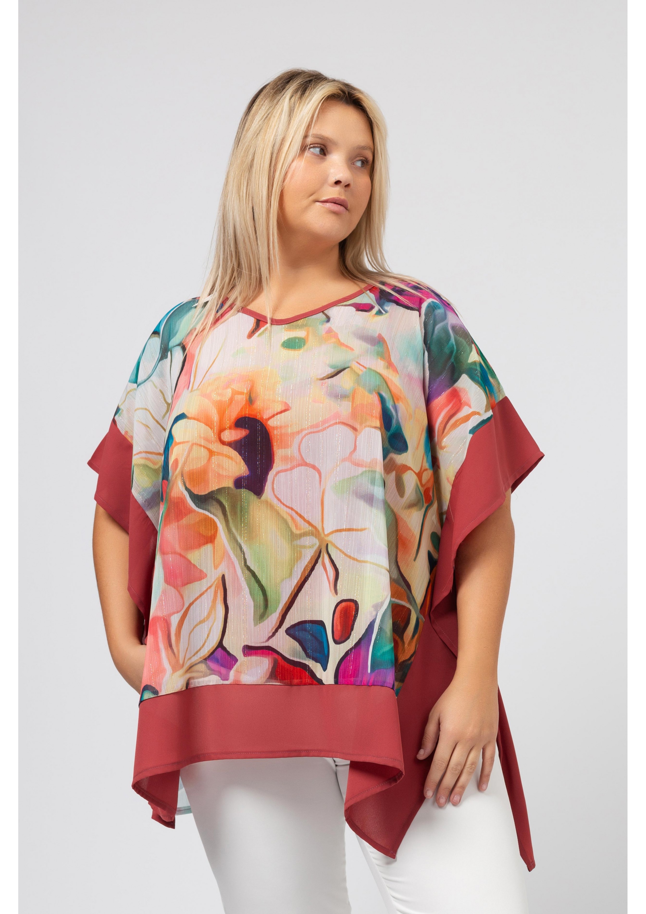 Poncho de tejido estampado...