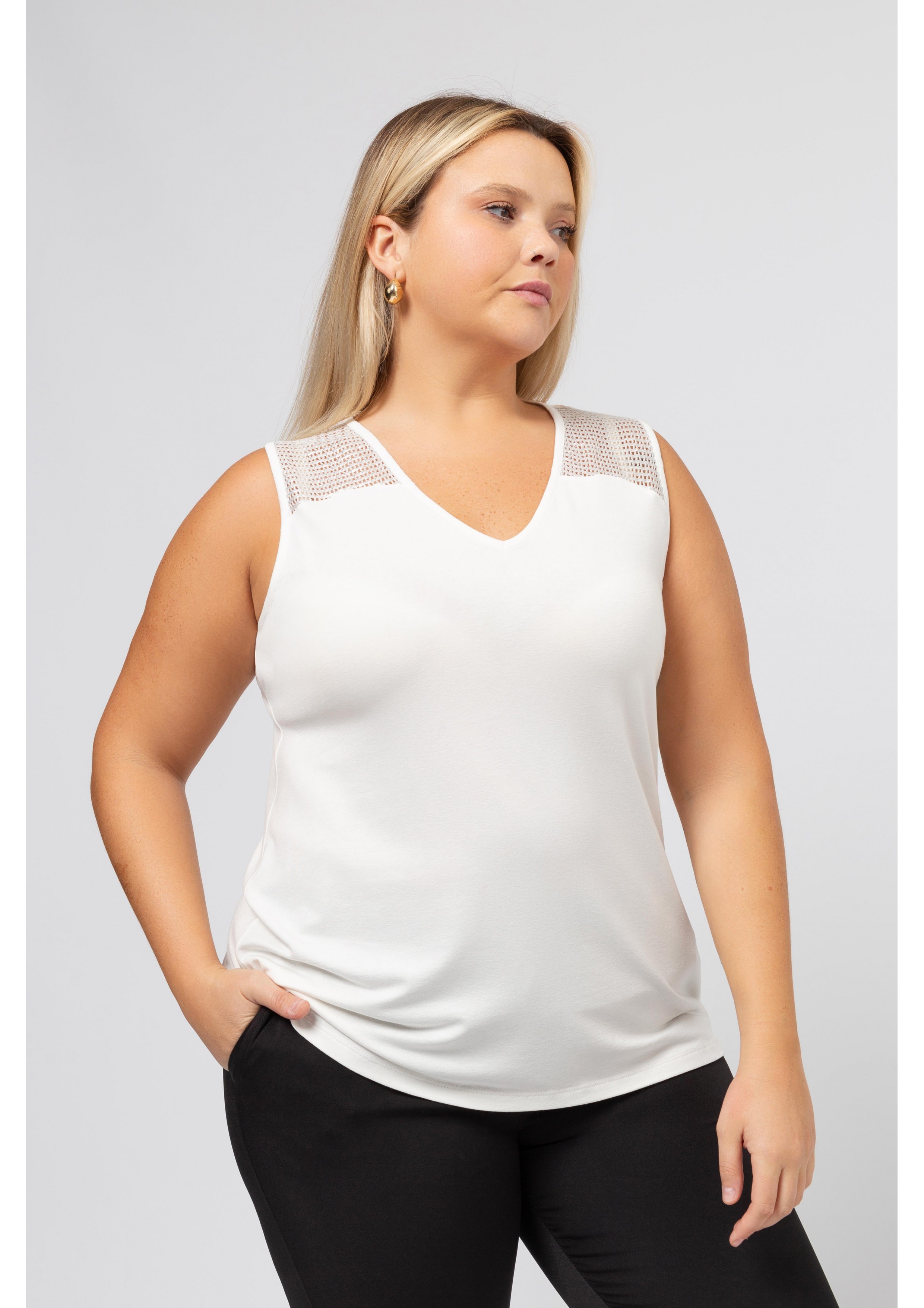 Top de malla lisa Colección...