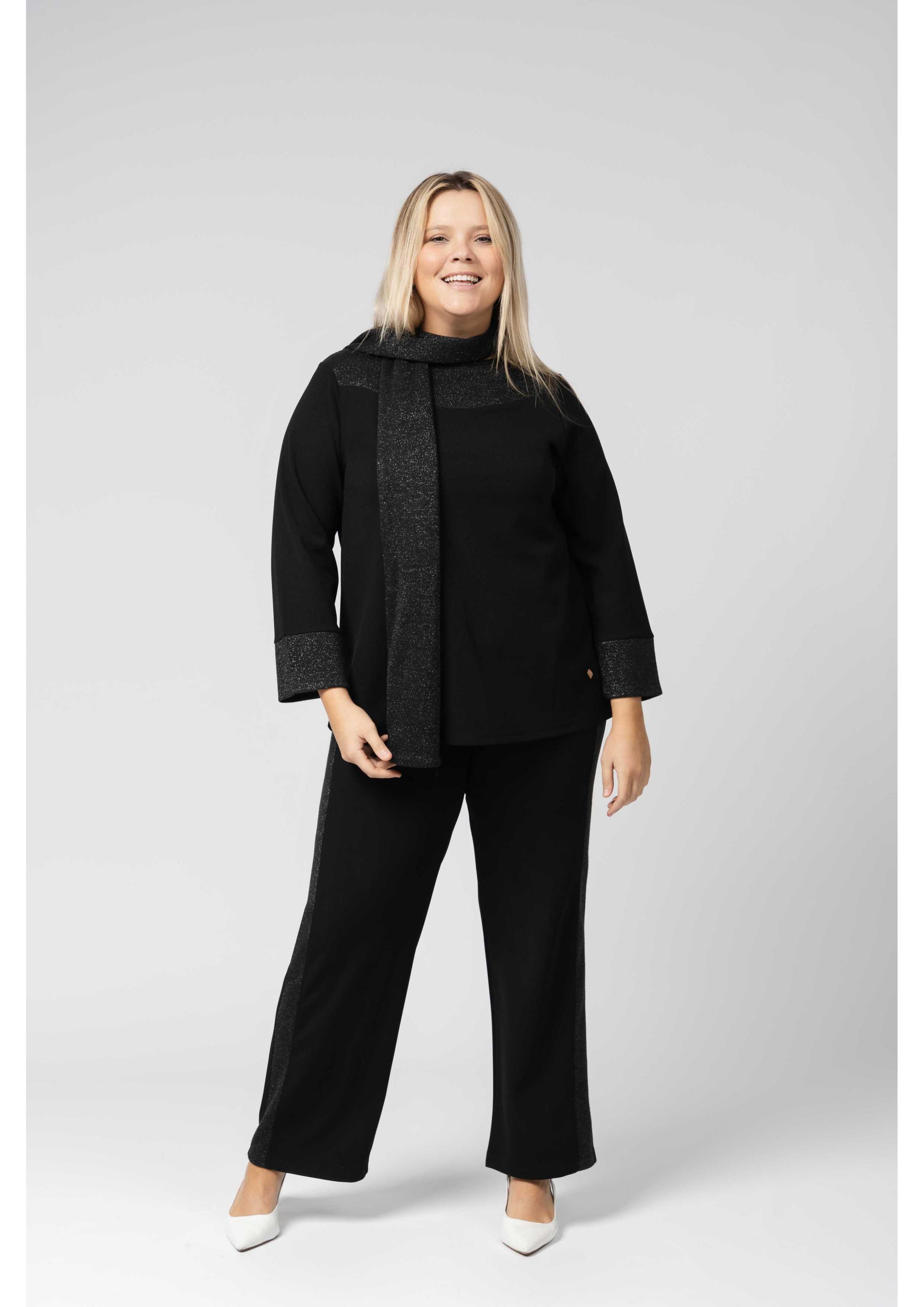 Conjunto pantalón y blusa...