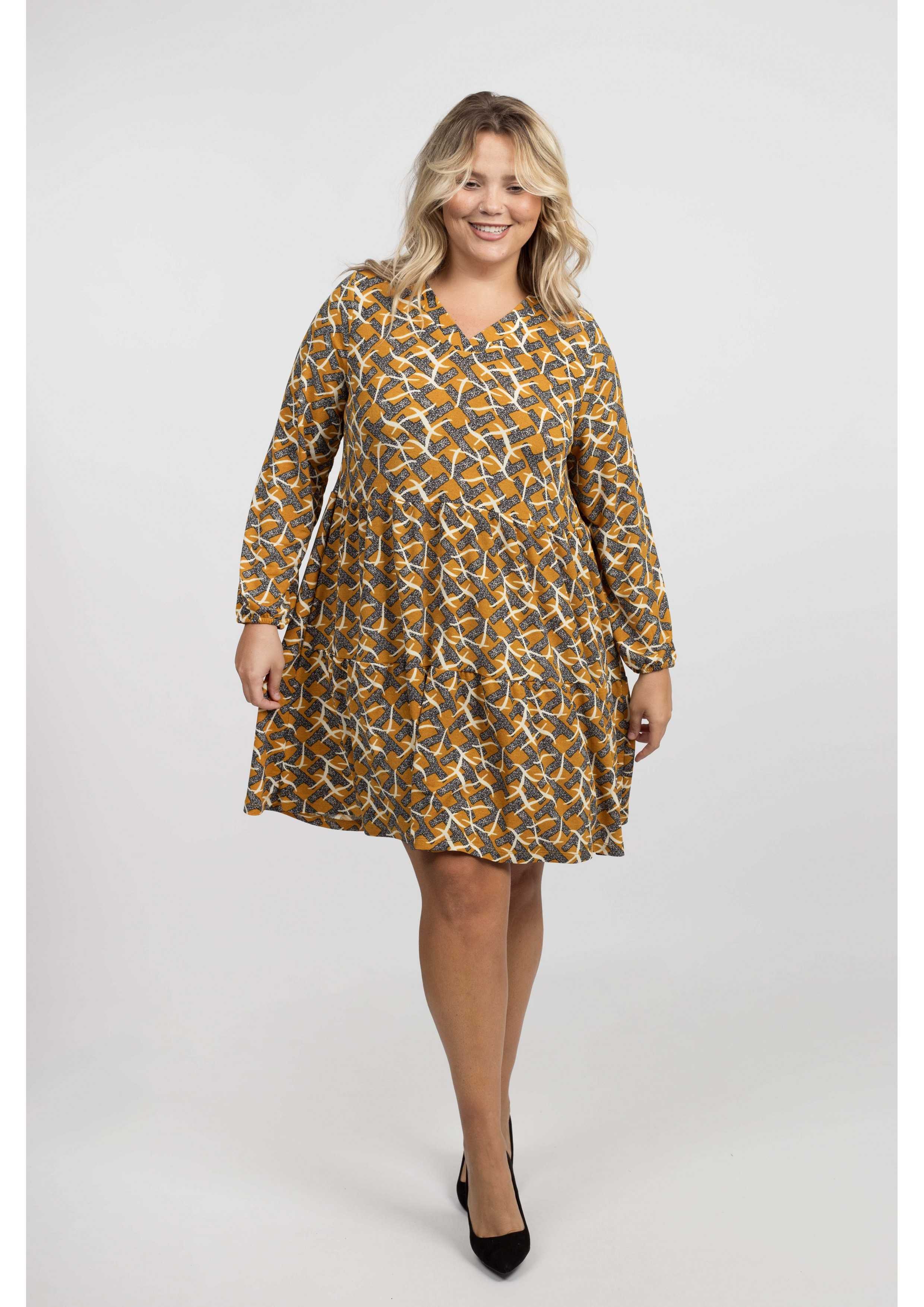 Robe en maille fleuri...