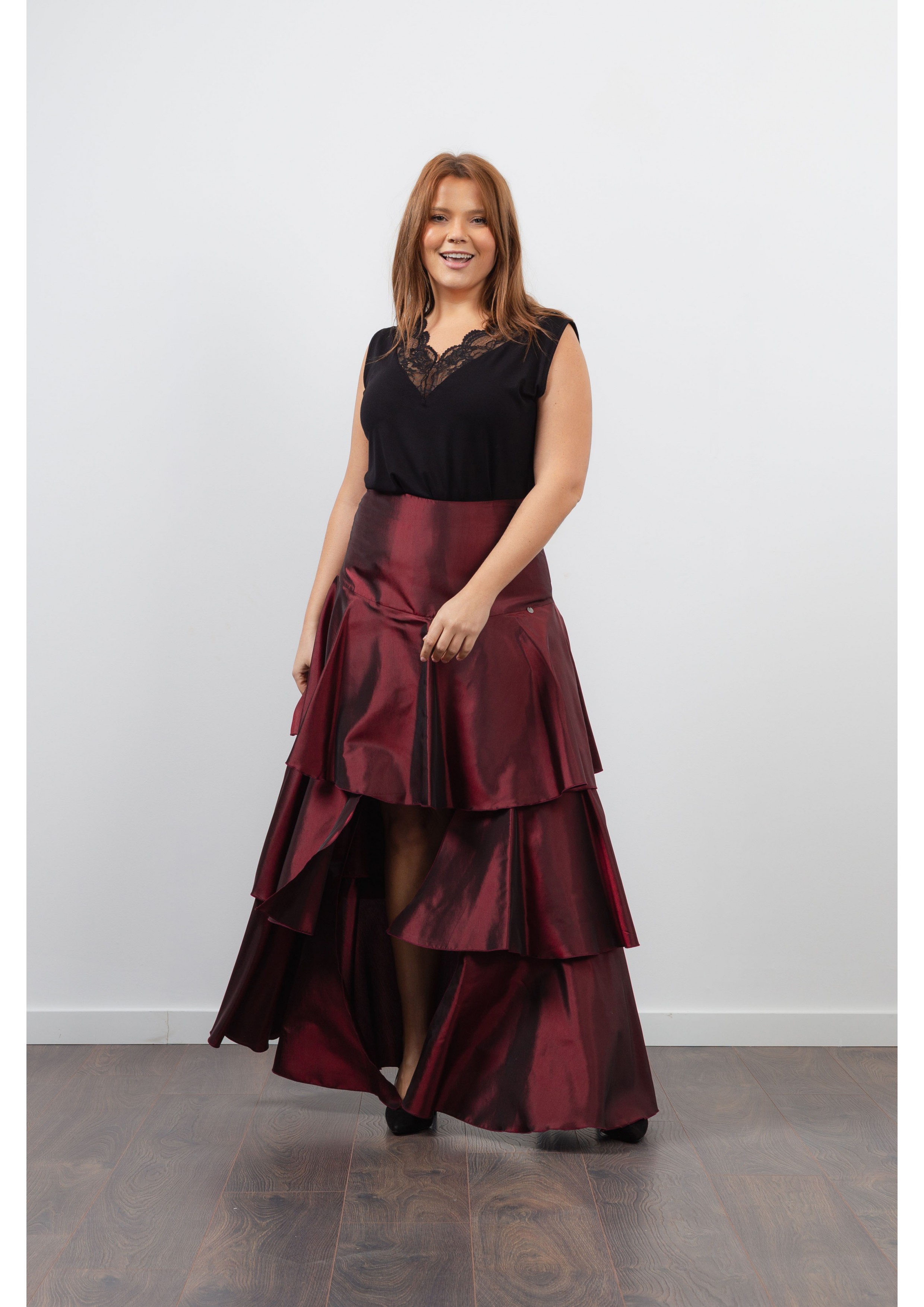 Falda larga con volantes en...