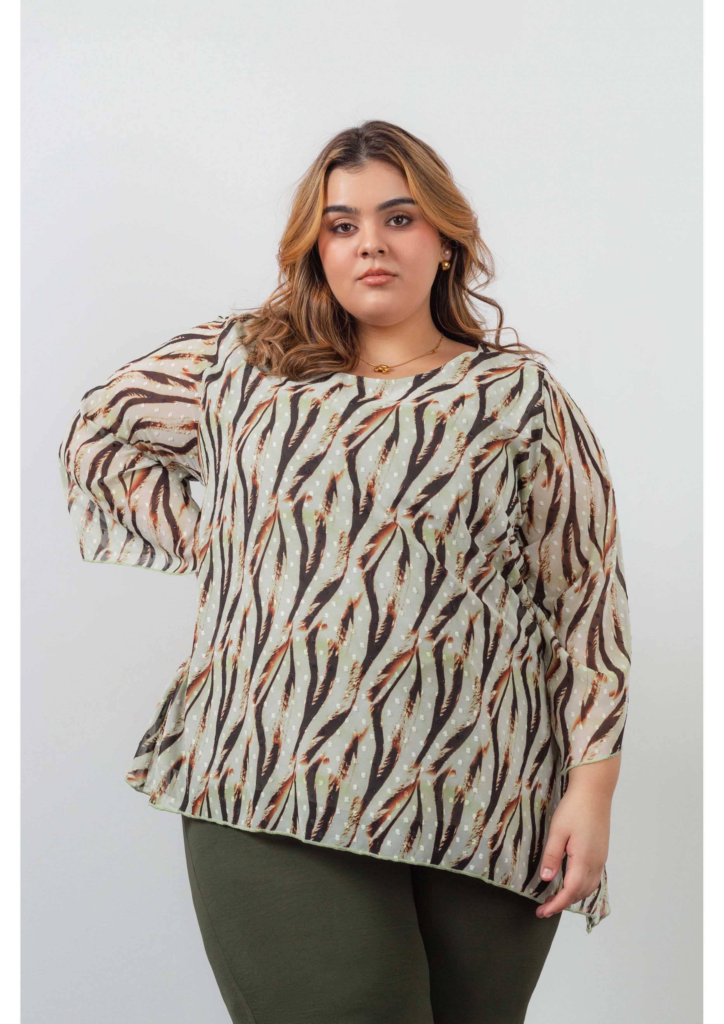 Túnica de tejido fino...