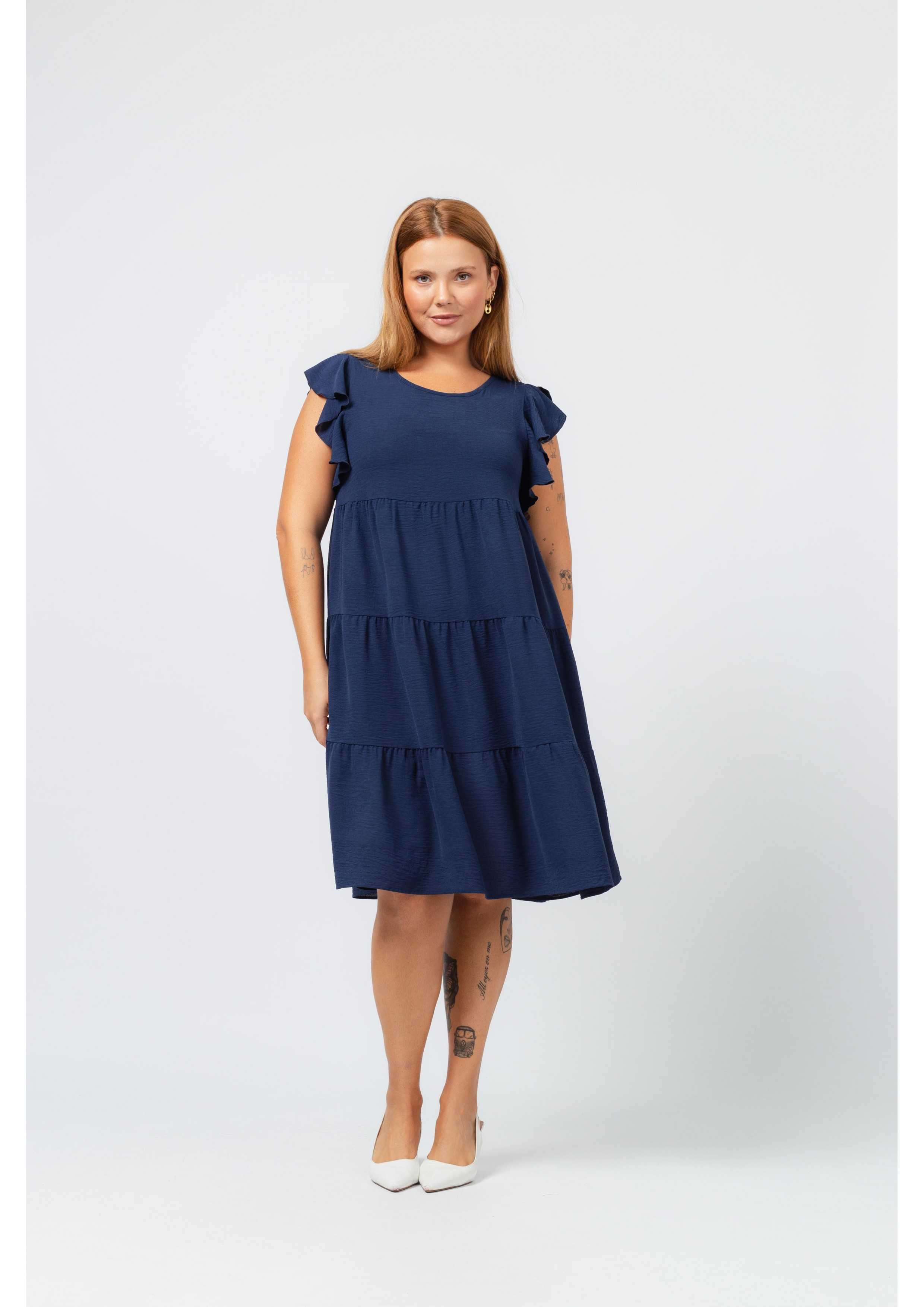 Robe en tissu uni...