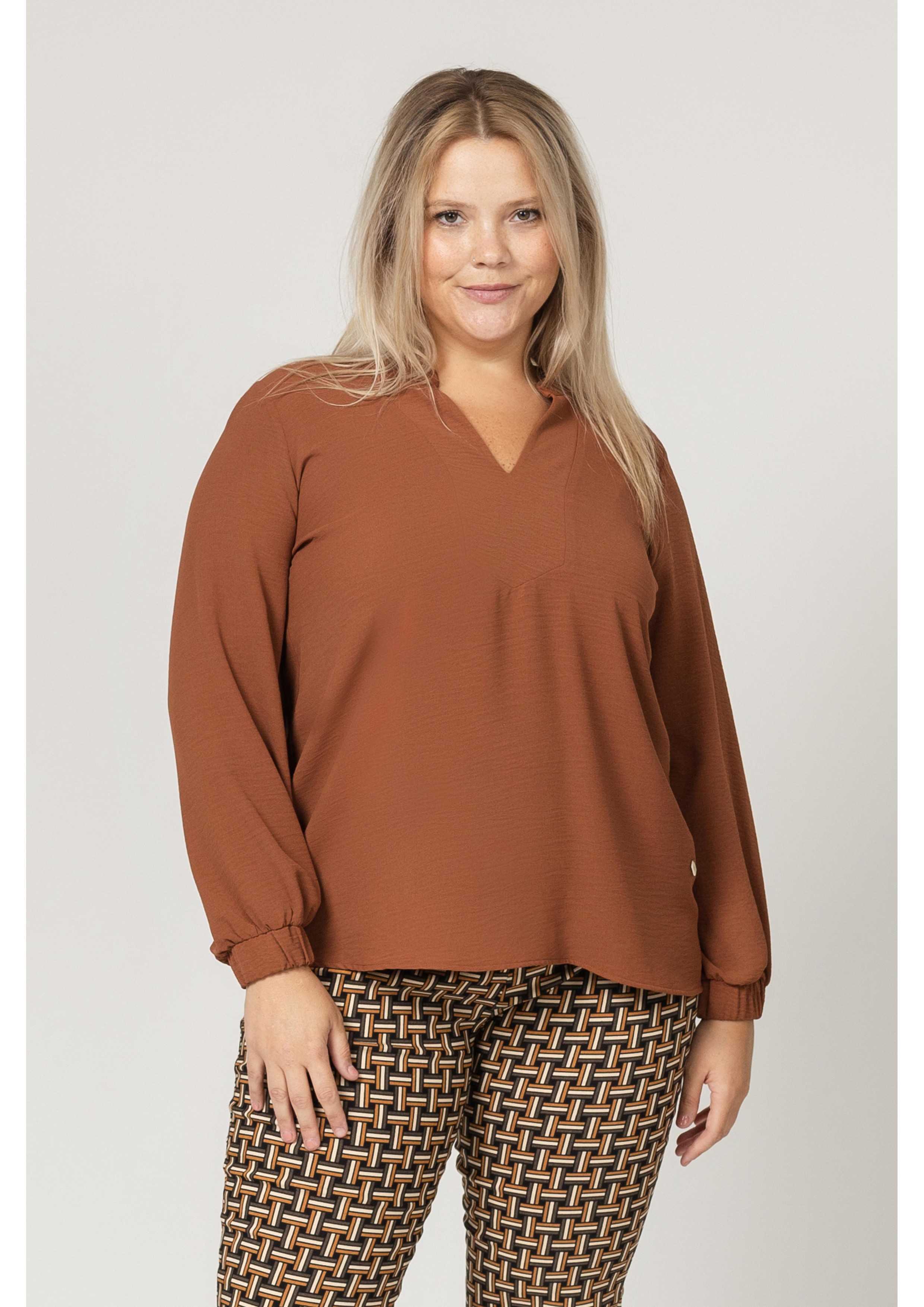 Blouse en tissu uni...